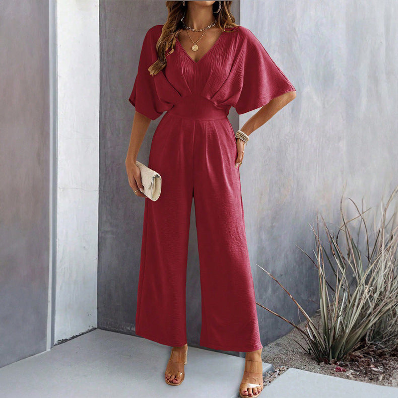 Dame Vid Jumpsuit med V-Hals og Elegant Drapering