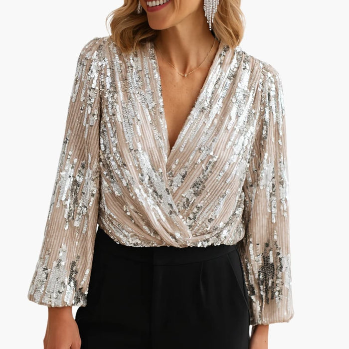 Blusa de mujer con cuello de pico y mangas largas, adornada con lentejuelas