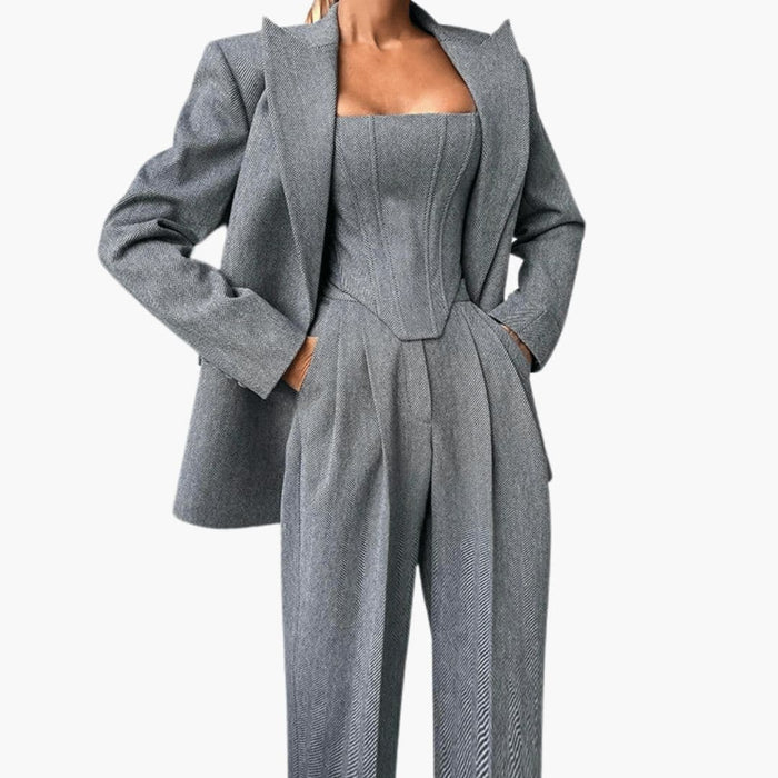 Completo da donna con pantaloni e giacca corsetto
