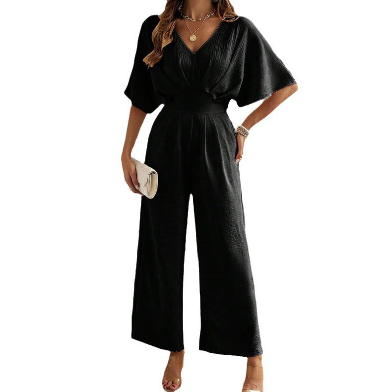 Dame Vid Jumpsuit med V-Hals og Elegant Drapering