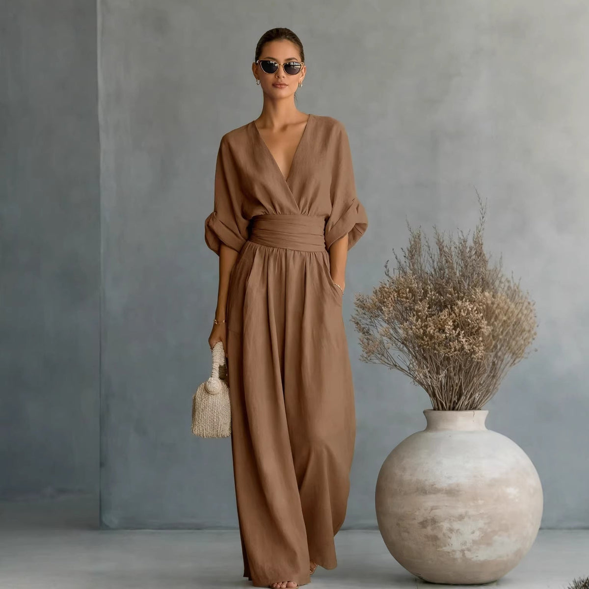 Dame Vid Jumpsuit med V-Hals og Elegant Drapering