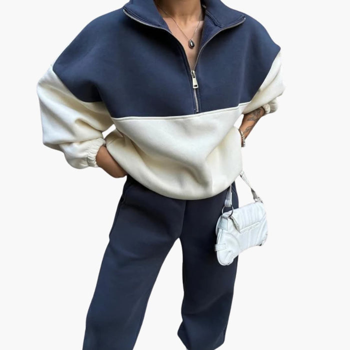 Maglione bicolore da donna con mezza cerniera e spalle scese