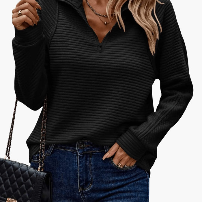 Maglione da donna con cerniera e superficie a coste